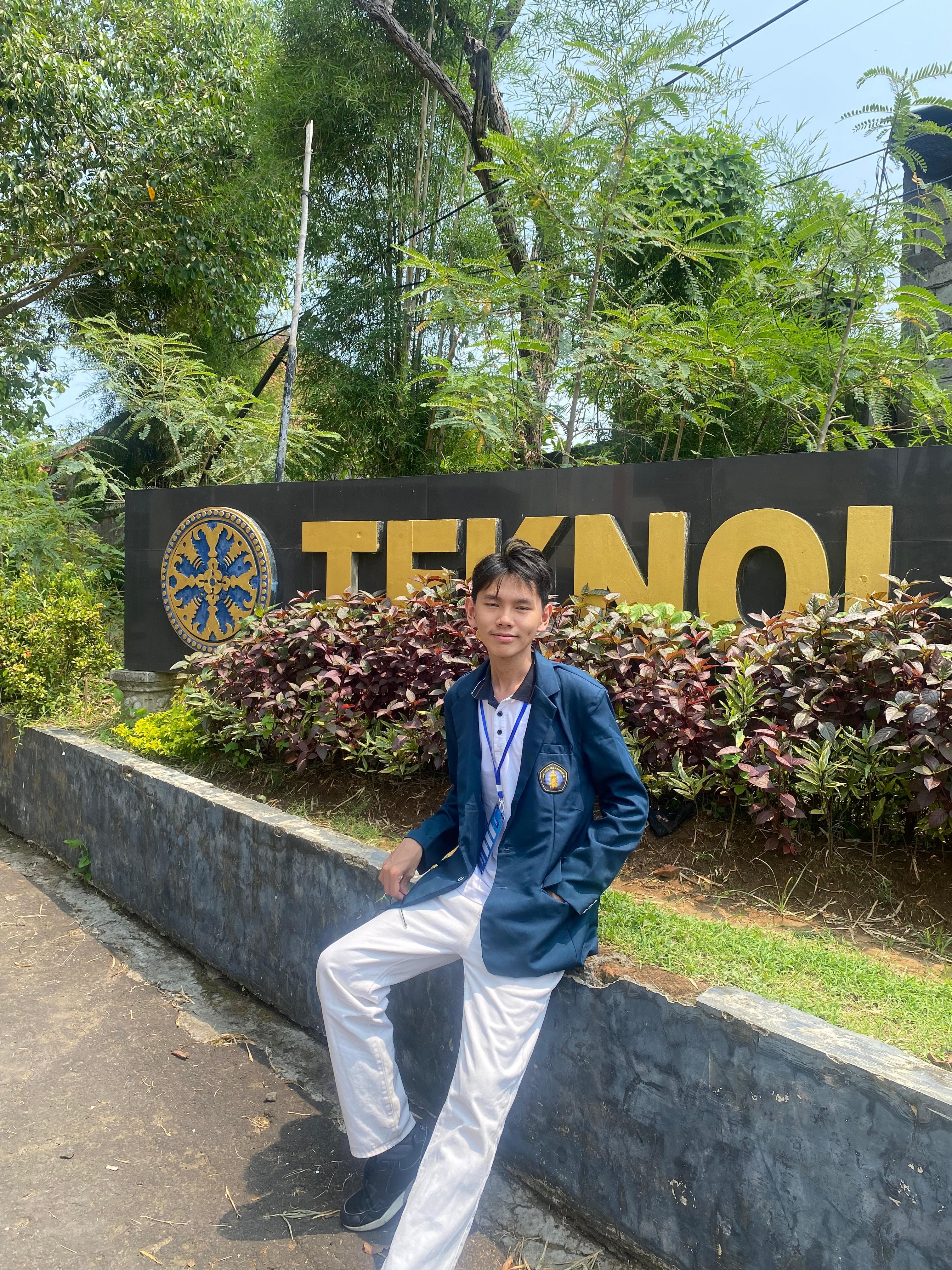 Richard visiting Udayana University during a student competition